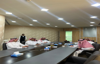 The Dean of the College meets with the Dean of Student Affairs.